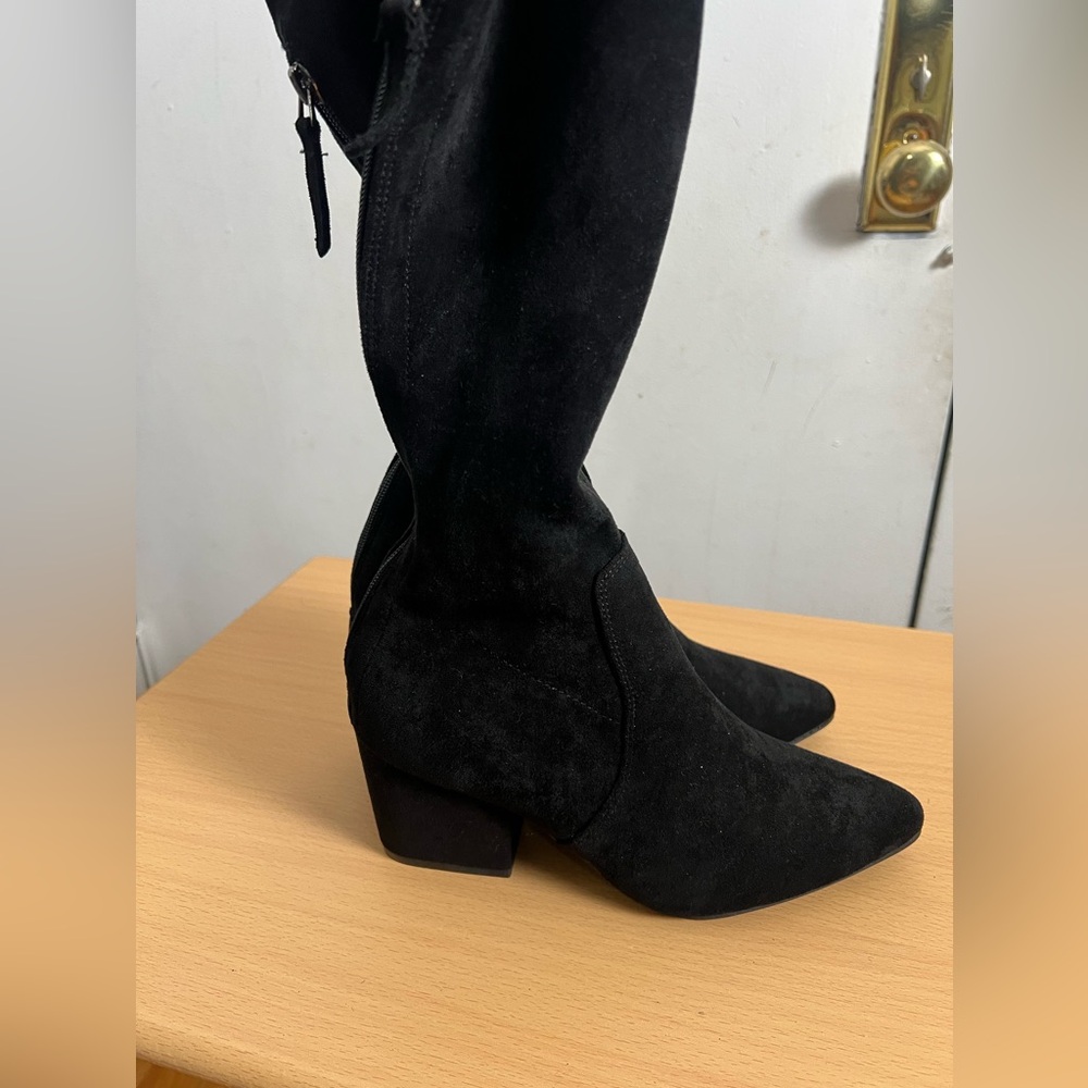 Over the knee suede boots in black. Brand new